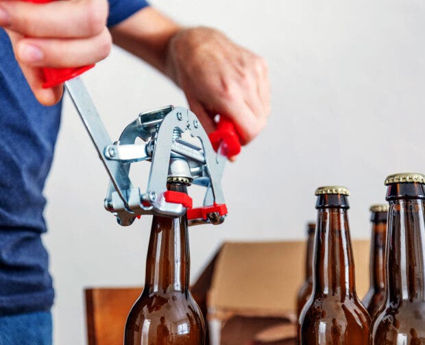 close up on sealing home-brewed beer