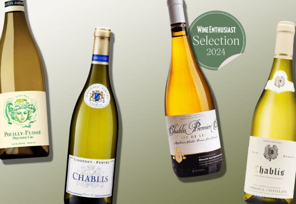 Bottles of WHite Burgundy on a designed background